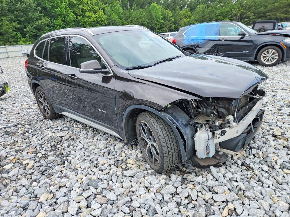 Photo 4 from auction – 2017 BMW X1 with VIN WBXHT3C39H5F87109