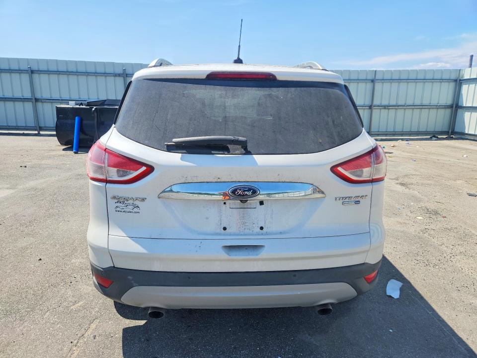 Photo 6 from auction – 2014 FORD ESCAPE with VIN 1FMCU9J93EUD82149