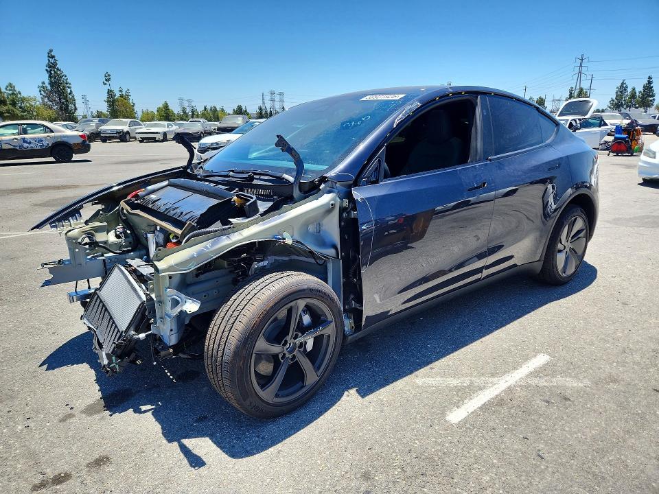 TESLA MODEL Y 2026 with VIN 7SAYGDEE7TF610190 - Photo from auction