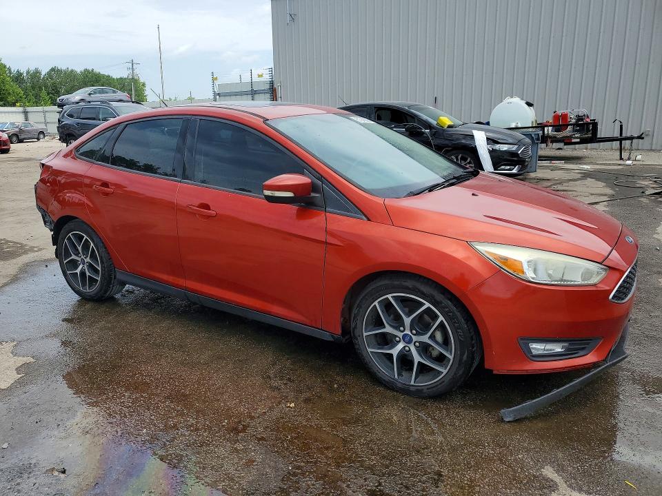 Photo 4 from auction – 2018 FORD FOCUS with VIN 1FADP3H25JL279312