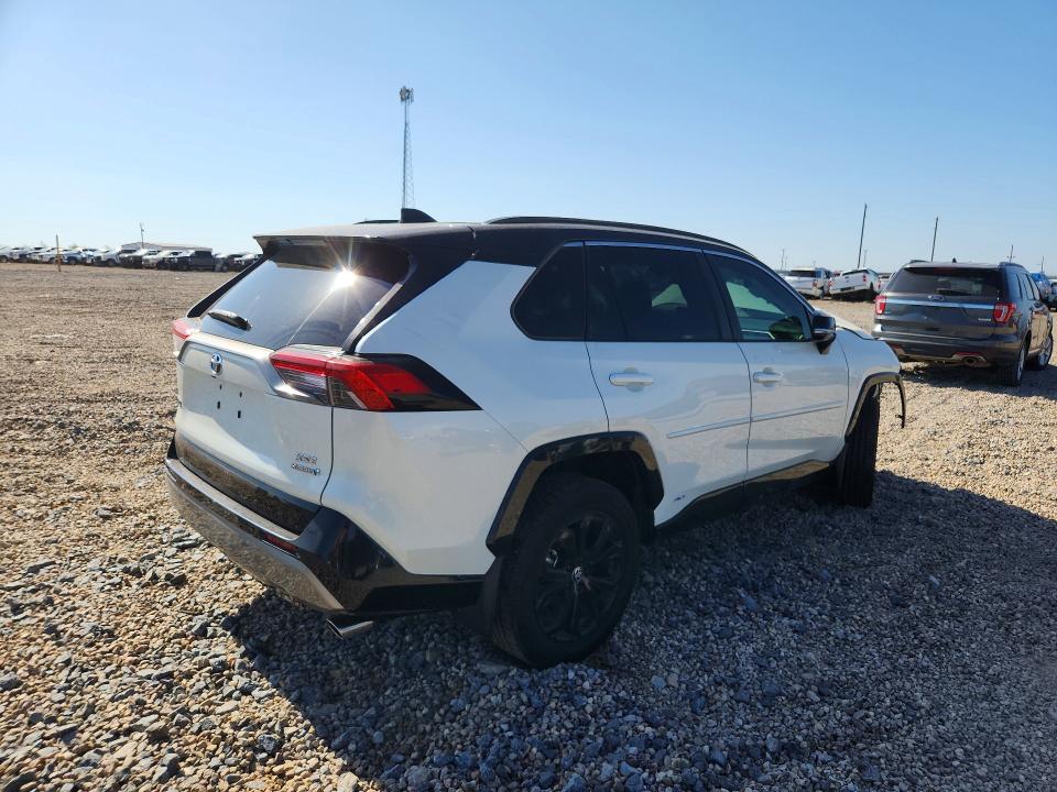 Photo 3 from auction – 2022 TOYOTA RAV4 with VIN 4T3E6RFV9NU093941