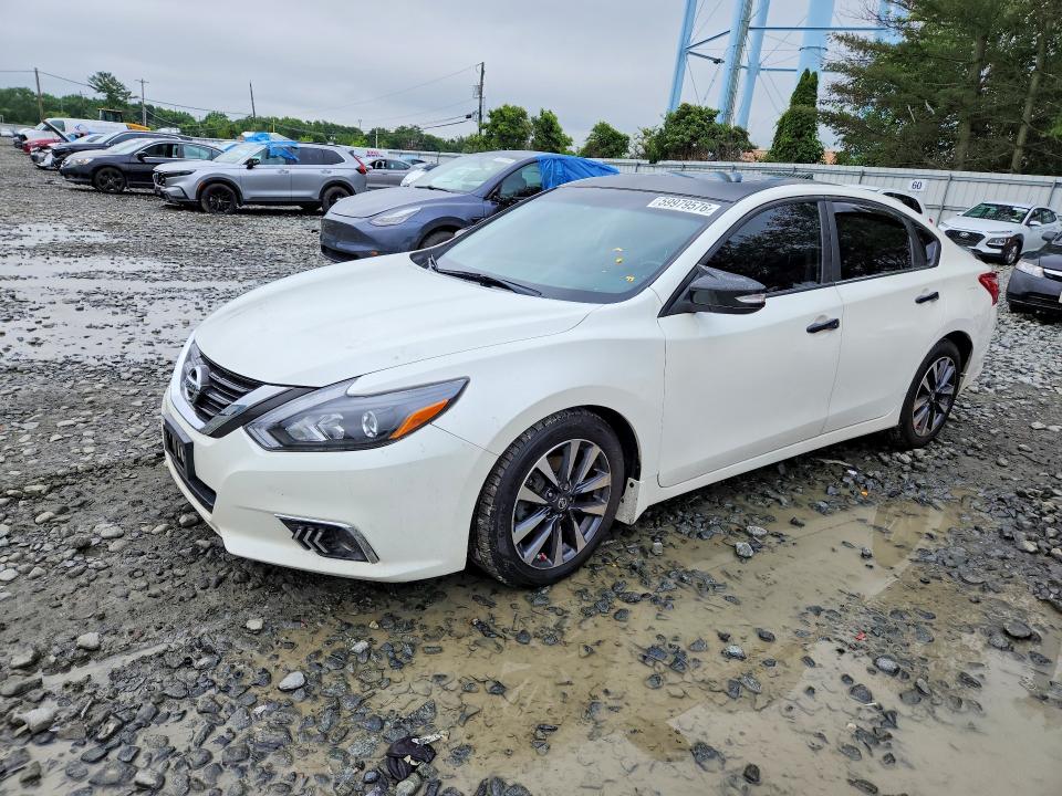 NISSAN ALTIMA 2017 with VIN 1N4AL3AP2HC129477 - Photo from auction