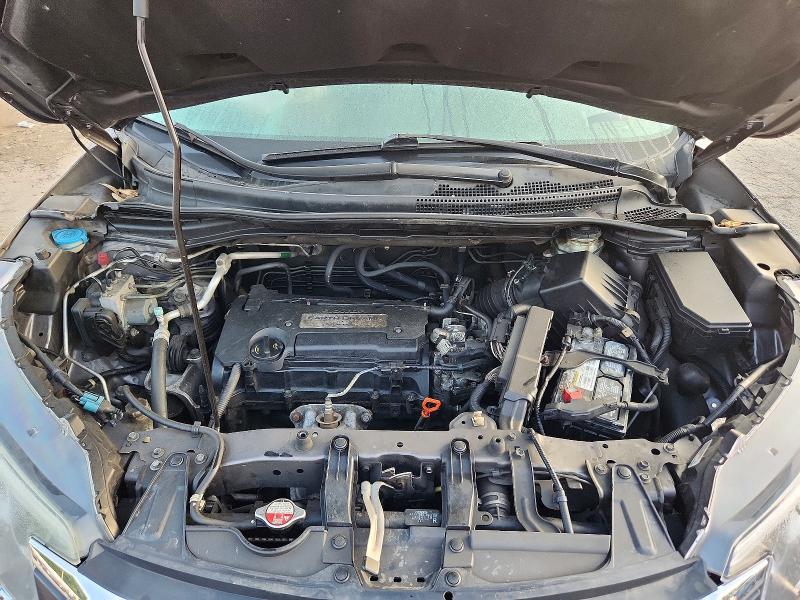 Photo 12 from auction – 2015 HONDA CR-V with VIN 5J6RM4H72FL052431