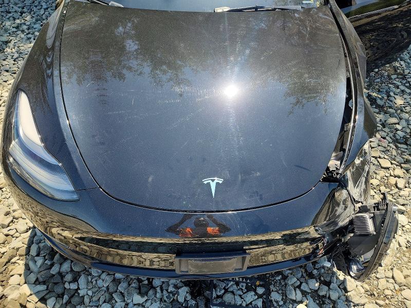Photo 11 from auction – 2023 TESLA MODEL Y with VIN 7SAYGDEE7PA188005