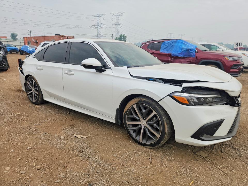 Photo 4 from auction – 2022 HONDA CIVIC with VIN 2HGFE1F98NH303247