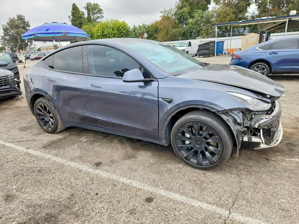 Photo 4 from auction – 2023 TESLA MODEL Y with VIN 7SAYGDEE6PF926587