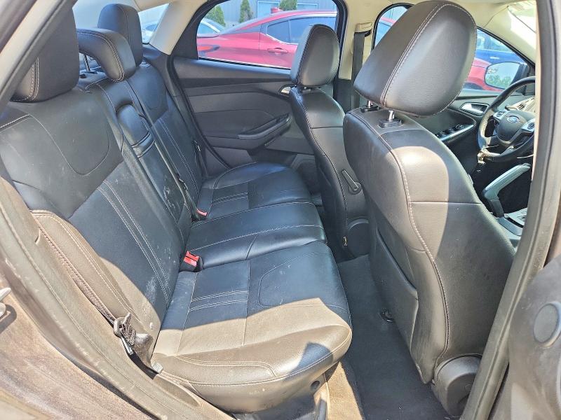 Photo 10 from auction – 2013 FORD FOCUS with VIN 1FADP3J23DL299881