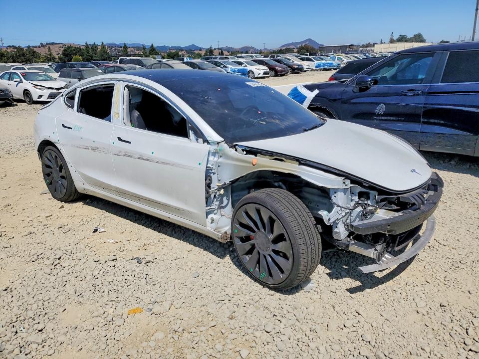 Photo 4 from auction – 2022 TESLA MODEL 3 with VIN 5YJ3E1EC7NF356848