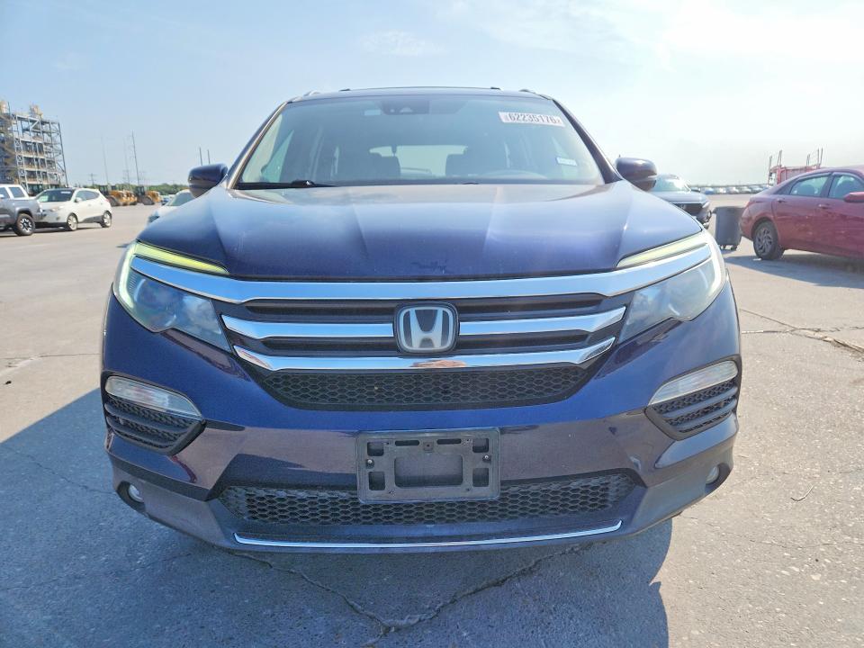 Photo 5 from auction – 2018 HONDA PILOT with VIN 5FNYF6H02JB000173