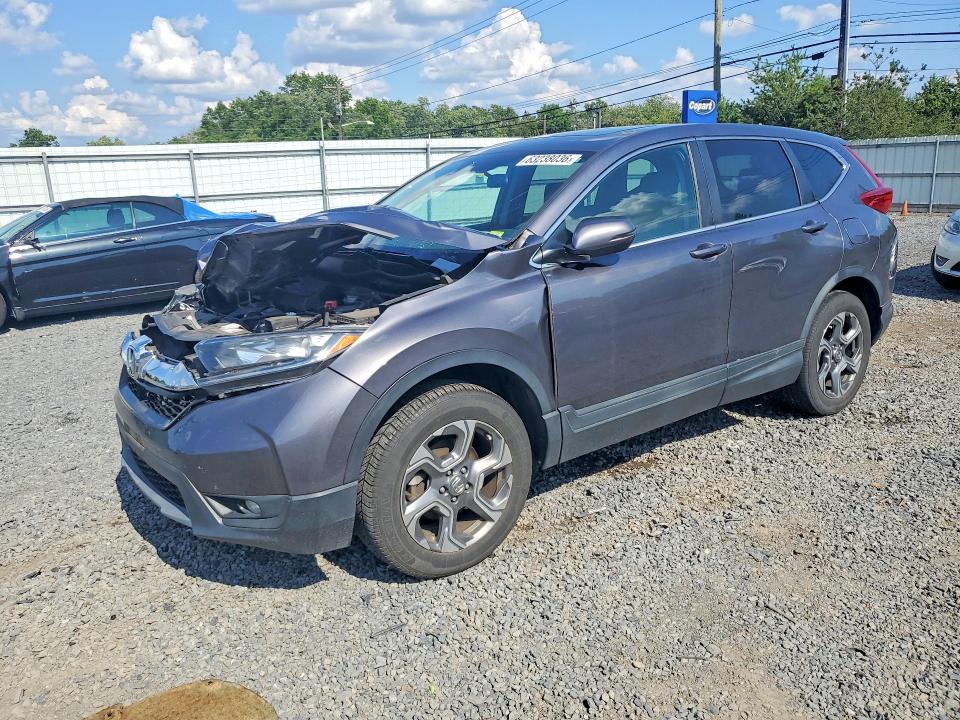 Photo 1 from auction – 2018 HONDA CR-V with VIN 5J6RW2H59JA000490