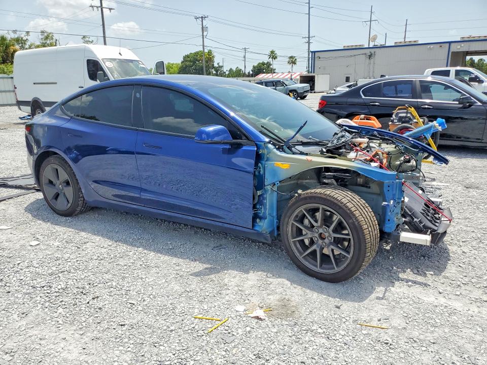 Photo 4 from auction – 2022 TESLA MODEL 3 with VIN 5YJ3E1EB2NF246569