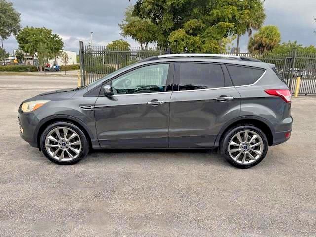 Photo 12 from auction – 2016 FORD ESCAPE with VIN 1FMCU0GX4GUC35892