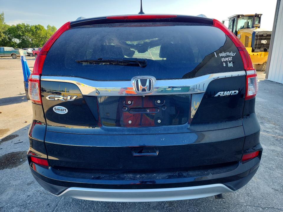 Photo 6 from auction – 2016 HONDA CR-V with VIN 5J6RM4H74GL071970