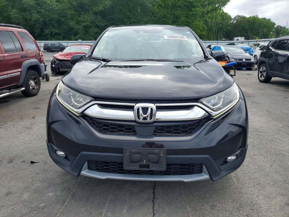 Photo 5 from auction – 2017 HONDA CR-V with VIN 2HKRW2H80HH684784