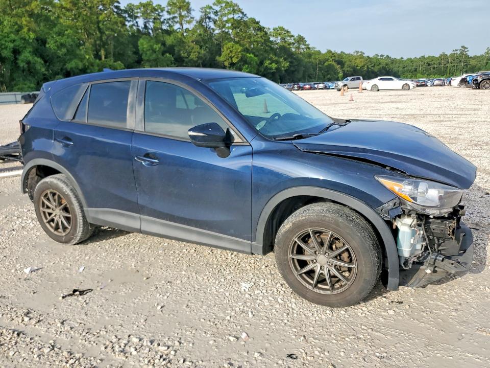 Photo 4 from auction – 2016 MAZDA CX-5 with VIN JM3KE2BY0G0885472