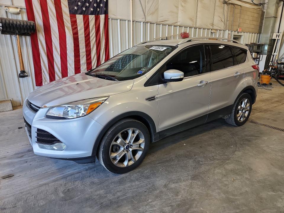 FORD ESCAPE 2014 with VIN 1FMCU9JX4EUD58358 - Photo from auction