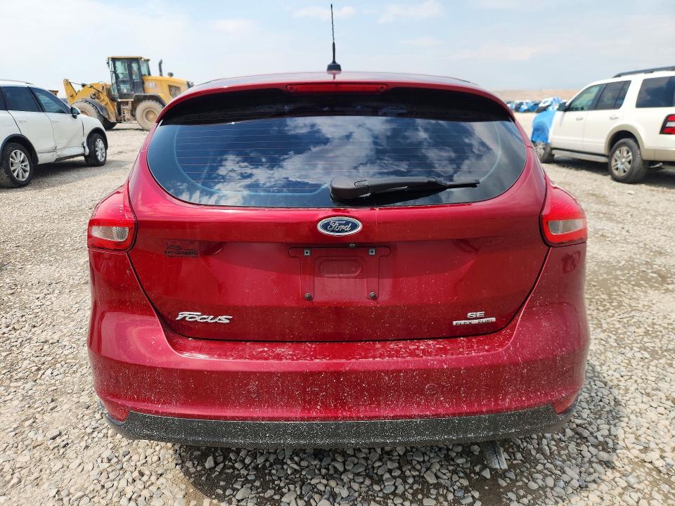 Foto 6 de la subasta – 2016 FORD FOCUS con VIN 1FADP3K28GL325801