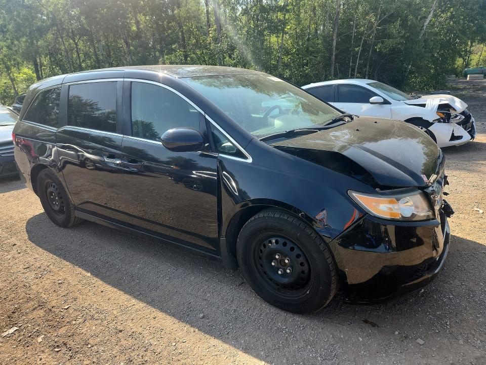Photo 4 from auction – 2016 HONDA ODYSSEY with VIN 5FNRL5H27GB510987