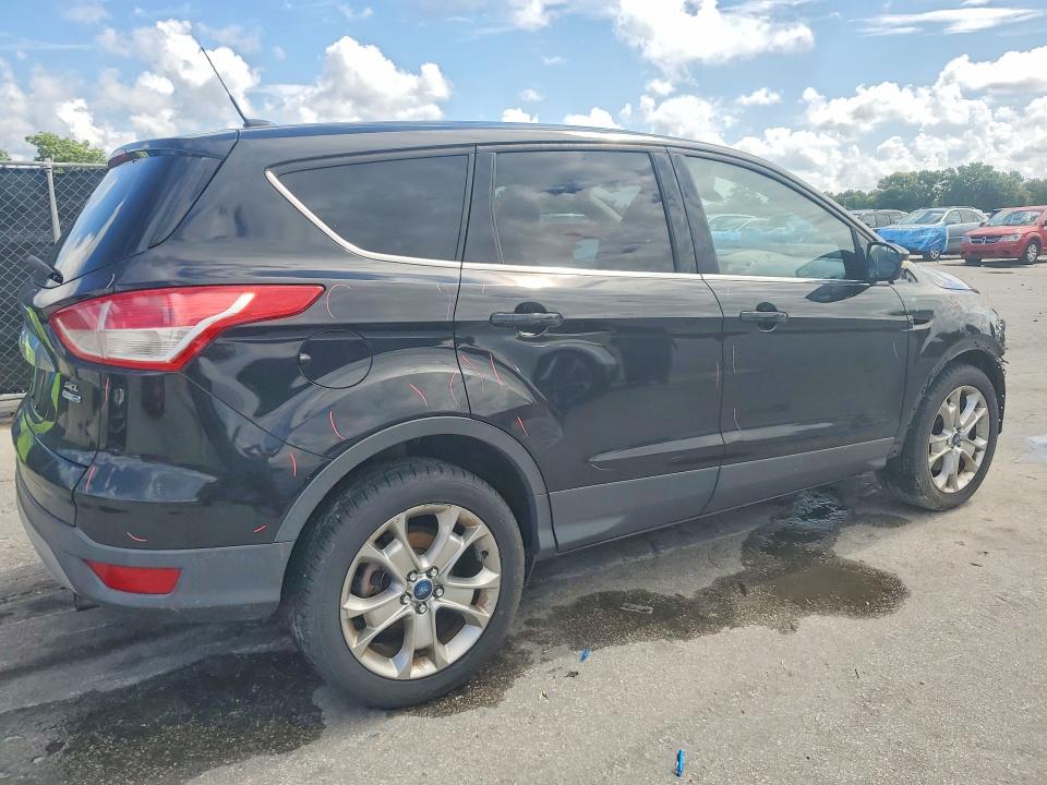 Photo 3 from auction – 2013 FORD ESCAPE with VIN 1FMCU9H97DUA41437