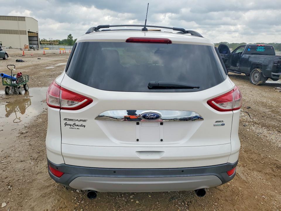 Photo 6 from auction – 2013 FORD ESCAPE with VIN 1FMCU9HX3DUB31246