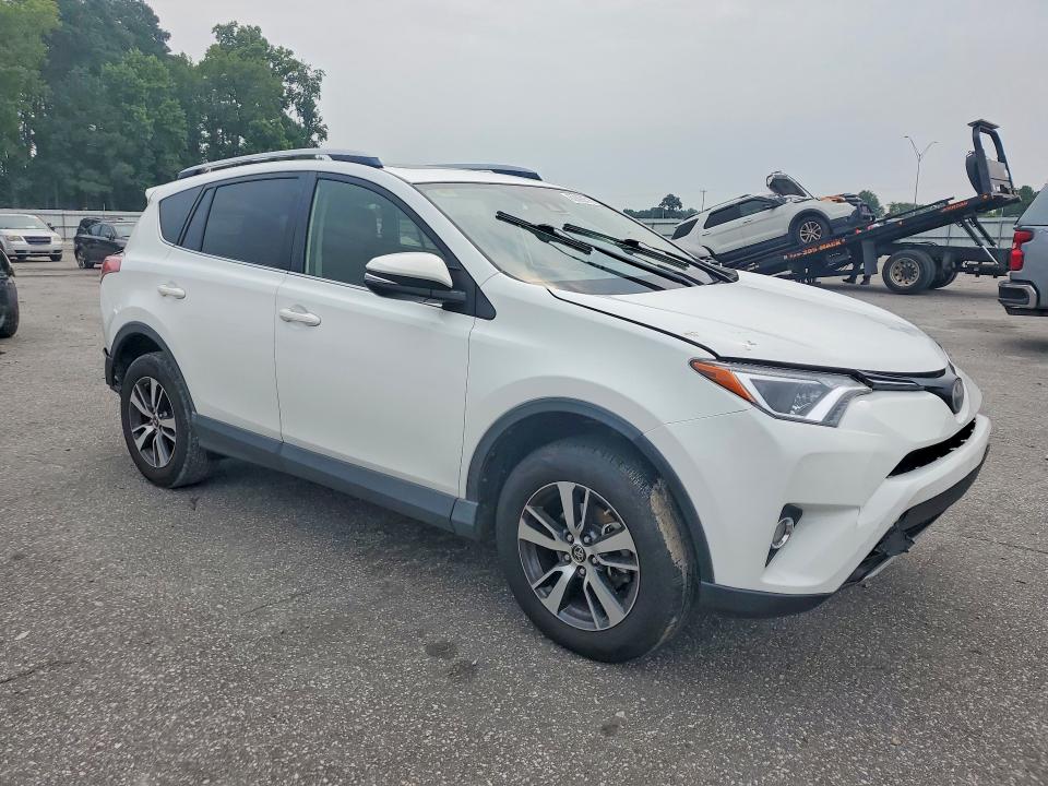 Photo 4 from auction – 2017 TOYOTA RAV4 with VIN JTMWFREV4HD107168