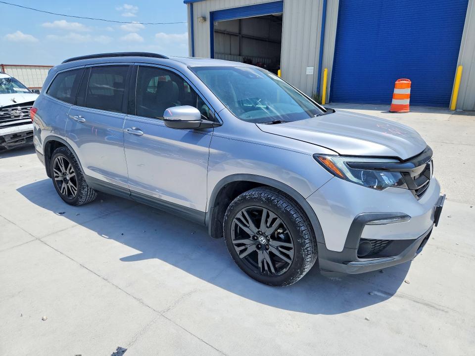 Photo 4 from auction – 2021 HONDA PILOT with VIN 5FNYF5H23MB029701