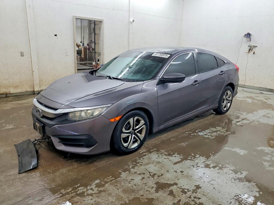 HONDA CIVIC 2018 with VIN 19XFC2F57JE002076 - Photo from auction