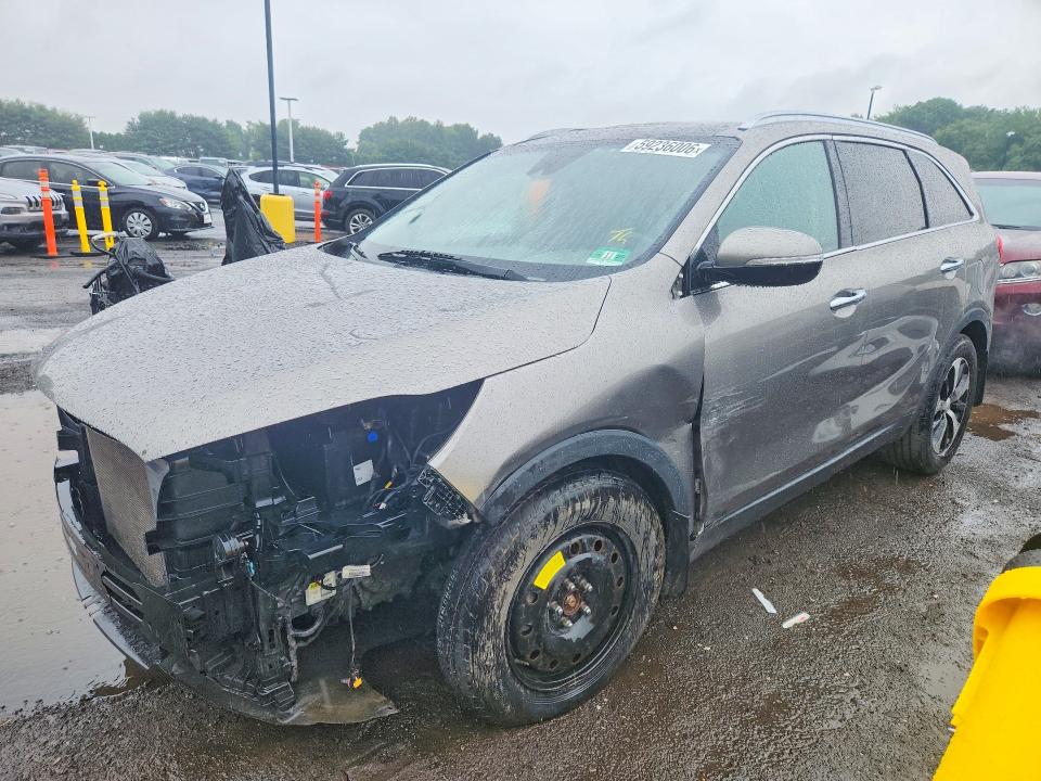 KIA SORENTO 2017 with VIN 5XYPH4A51HG305005 - Photo from auction