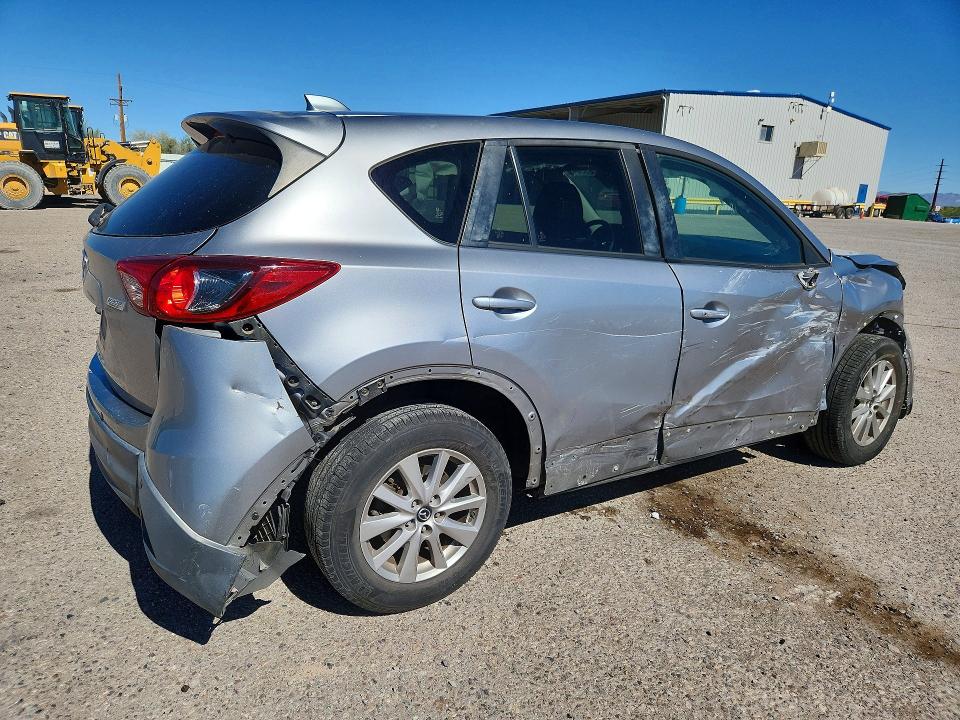 Photo 3 from auction – 2015 MAZDA CX-5 with VIN JM3KE2CY8F0504562