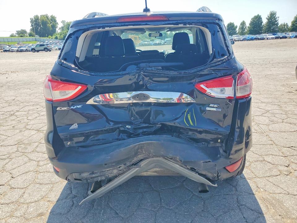 Photo 6 from auction – 2014 FORD ESCAPE with VIN 1FMCU9G96EUC85115