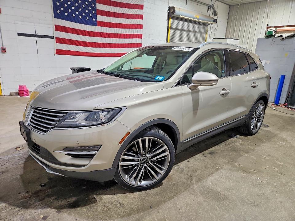 LINCOLN MKC 2015 with VIN 5LMTJ2AH1FUJ07126 - Photo from auction