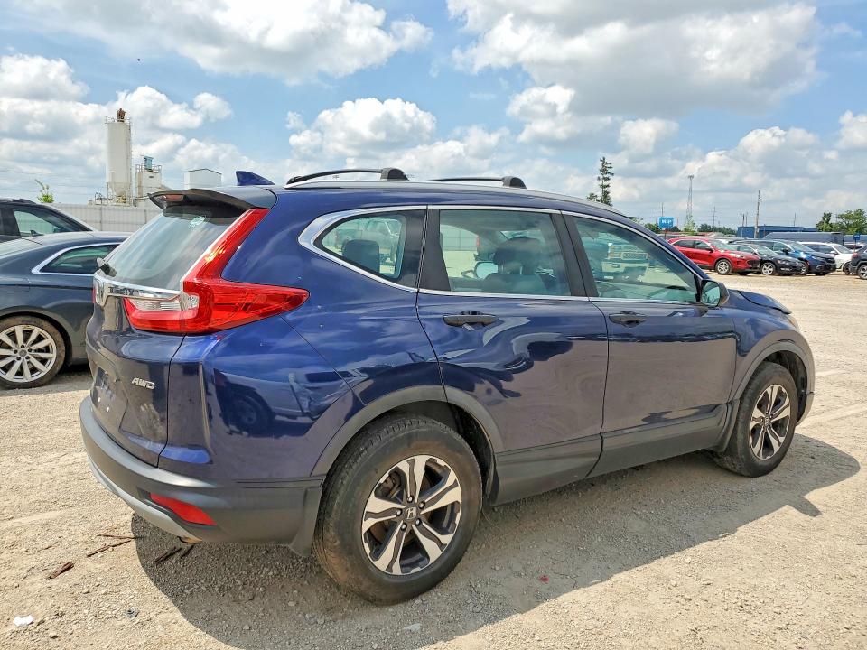 Photo 3 from auction – 2017 HONDA CR-V with VIN 5J6RW6H39HL006245