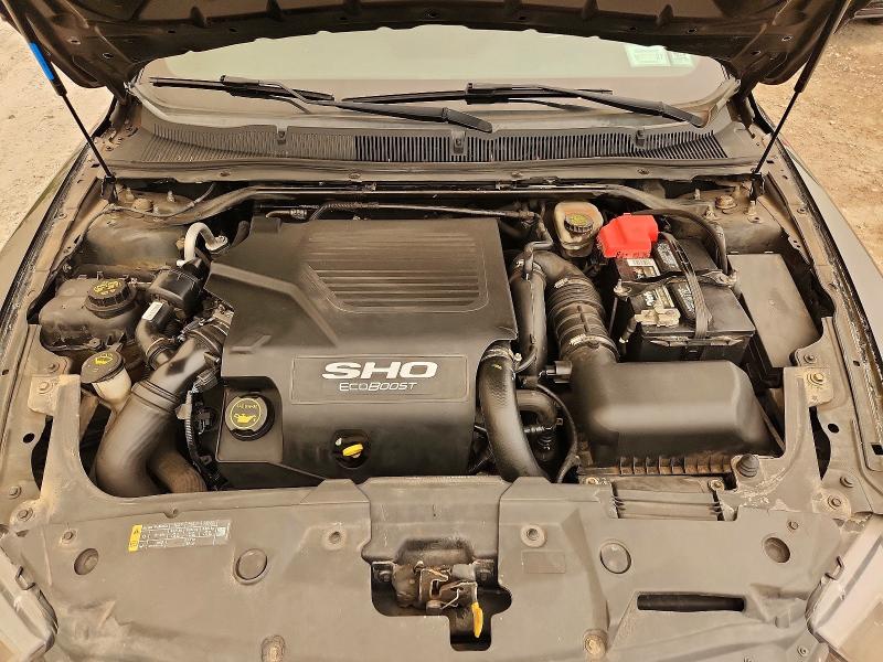Photo 11 from auction – 2015 FORD TAURUS with VIN 1FAHP2KT7FG114262