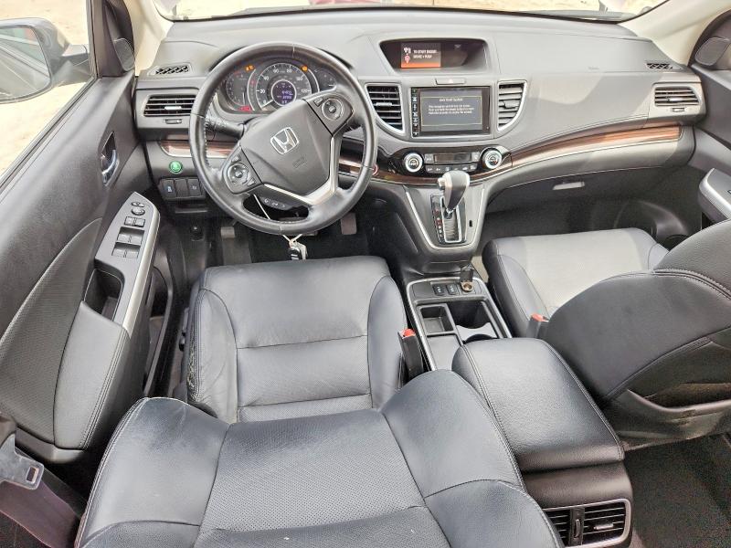 Photo 8 from auction – 2015 HONDA CR-V with VIN 2HKRM4H73FH617019