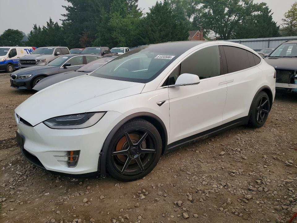 TESLA MODEL X 2017 with VIN 5YJXCAE23HF035909 - Photo from auction