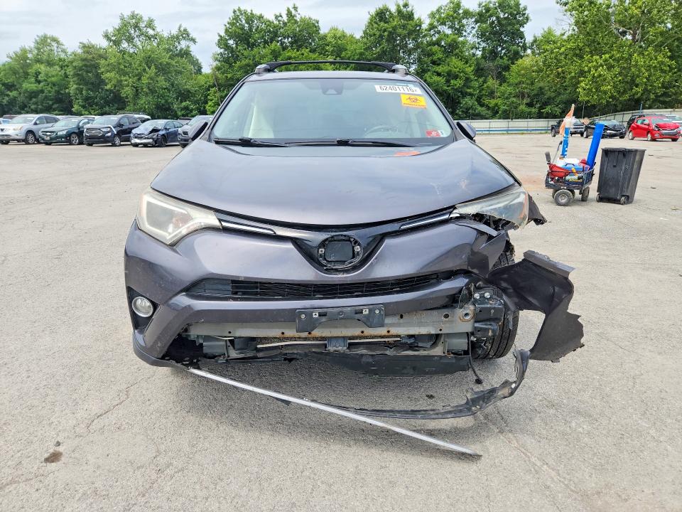 Photo 5 from auction – 2018 TOYOTA RAV4 with VIN JTMRFREV6JJ742459