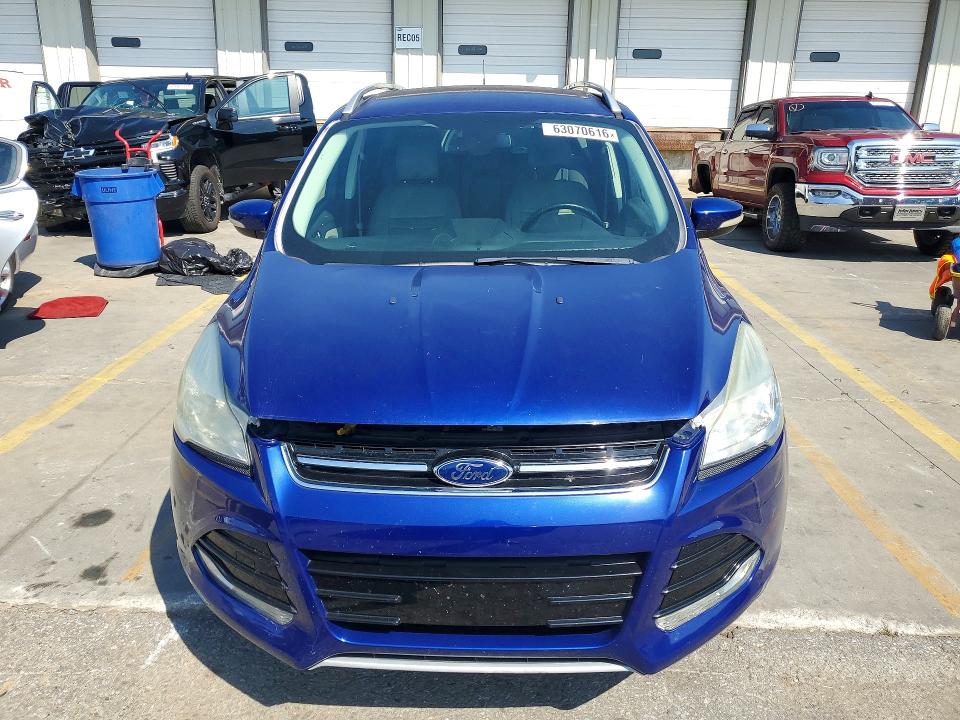 Photo 5 from auction – 2015 FORD ESCAPE with VIN 1FMCU0J91FUA39577