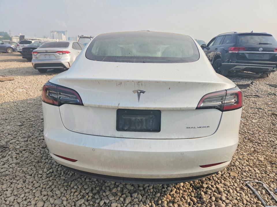 Photo 6 from auction – 2021 TESLA MODEL 3 with VIN 5YJ3E1EB5MF077565