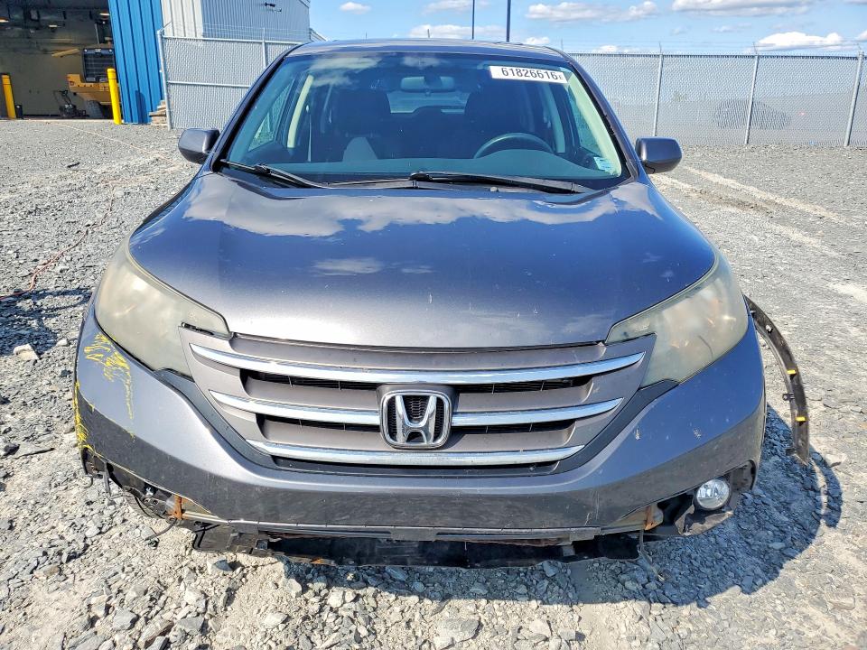 Photo 5 from auction – 2013 HONDA CR-V with VIN 2HKRM4H54DH117415