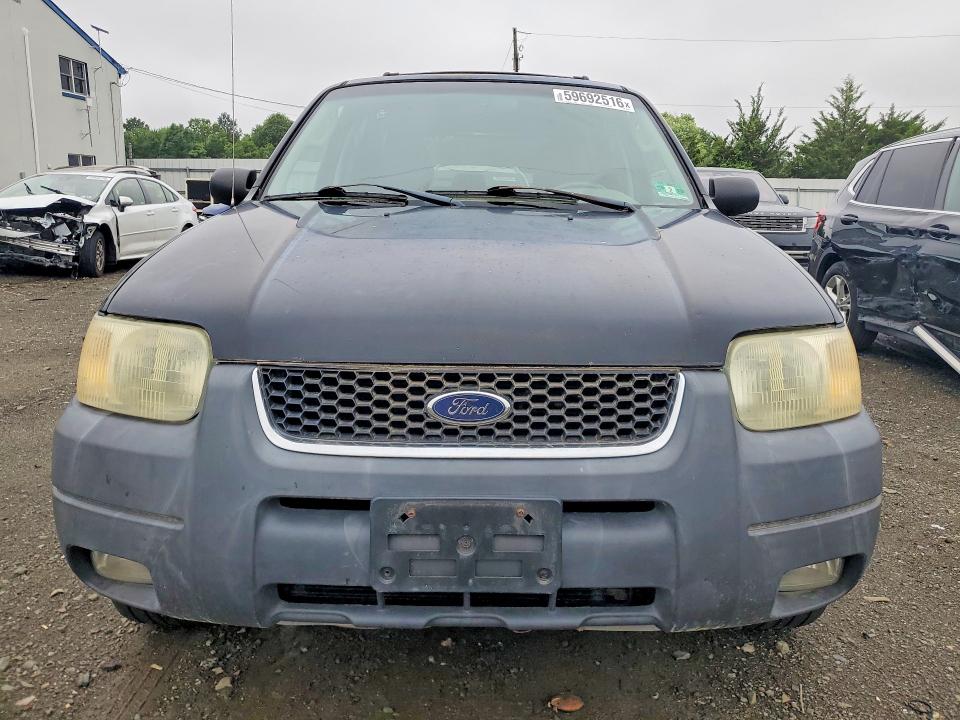 Photo 5 from auction – 2003 FORD ESCAPE with VIN 1FMYU93133KA02670