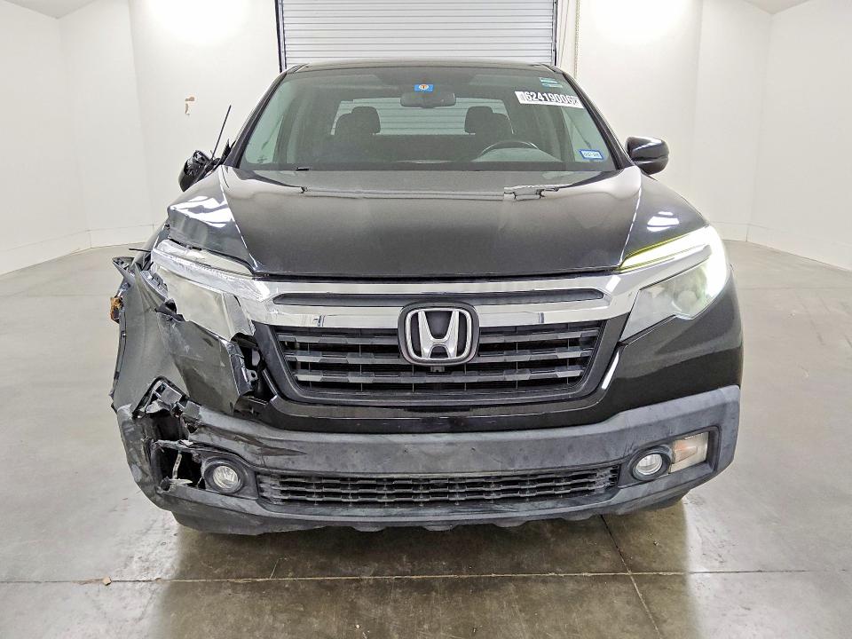 Photo 5 from auction – 2017 HONDA RIDGELINE with VIN 5FPYK2F66HB006250