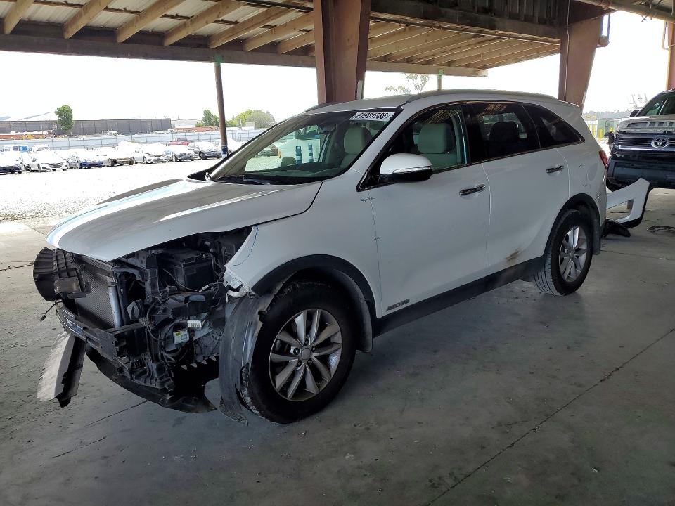 KIA SORENTO 2016 with VIN 5XYPGDA59GG173984 - Photo from auction