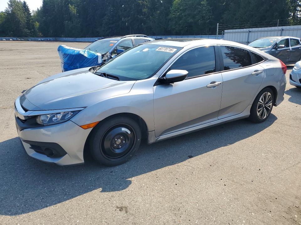 HONDA CIVIC 2016 with VIN 2HGFC1F75GH649733 - Photo from auction