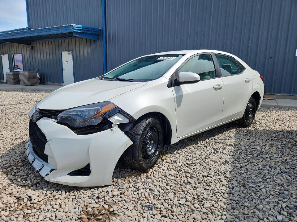TOYOTA COROLLA 2018 with VIN 5YFBURHE2JP774131 - Photo from auction