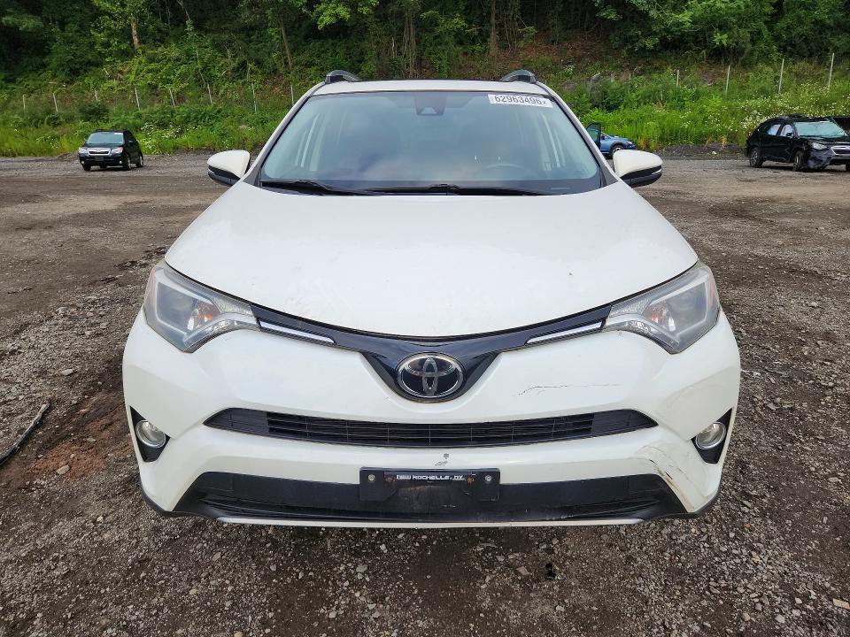 Photo 5 from auction – 2018 TOYOTA RAV4 with VIN JTMRFREV2JJ231444