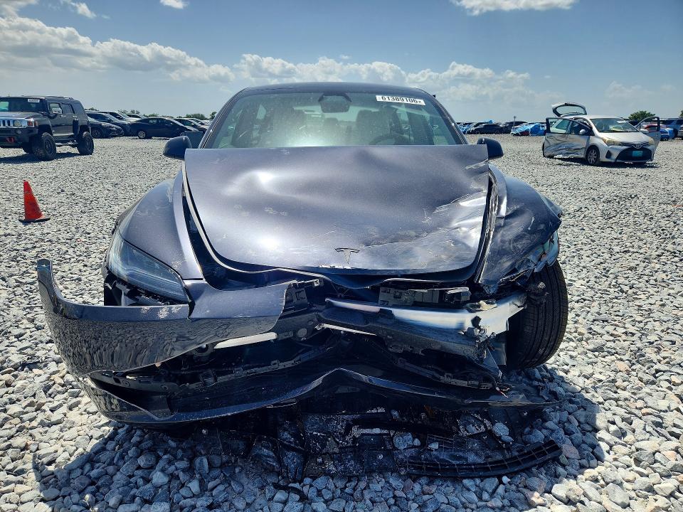 Photo 5 from auction – 2026 TESLA MODEL 3 with VIN 5YJ3E1EB5TF123524