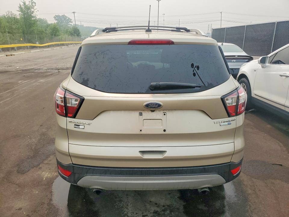Photo 6 from auction – 2017 FORD ESCAPE with VIN 1FMCU9J96HUD47464