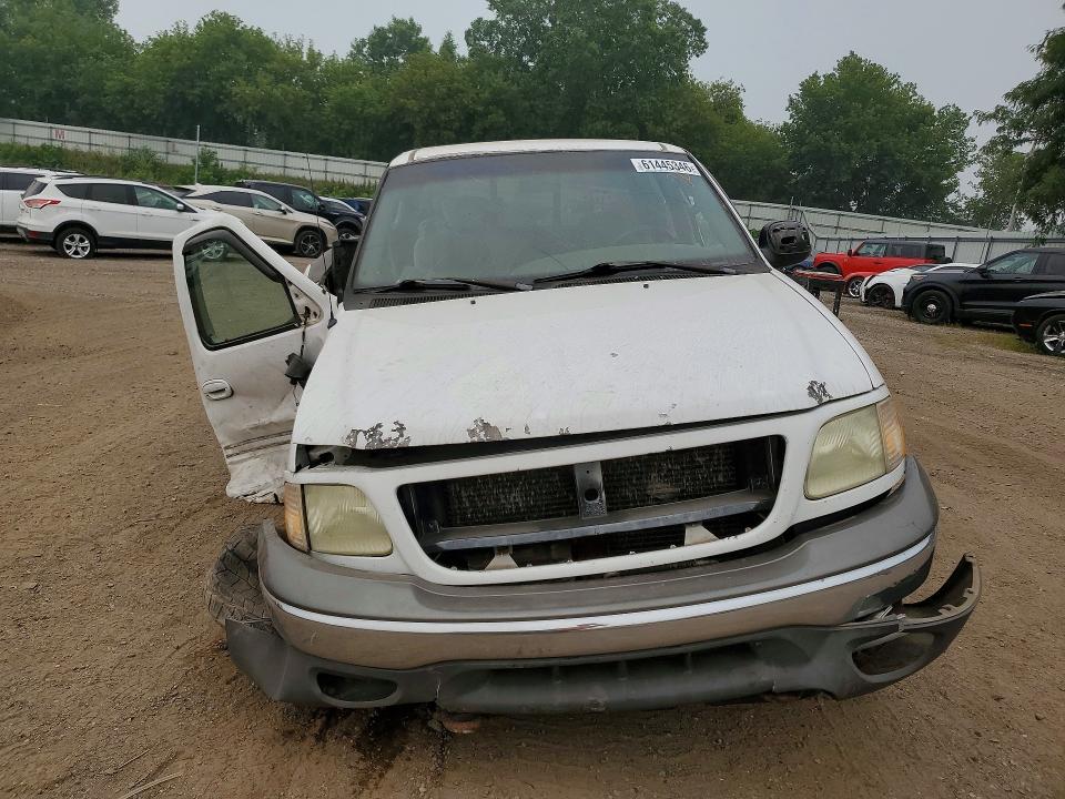 Photo 5 from auction – 2003 FORD F150 with VIN 1FTRX18L03NB42928