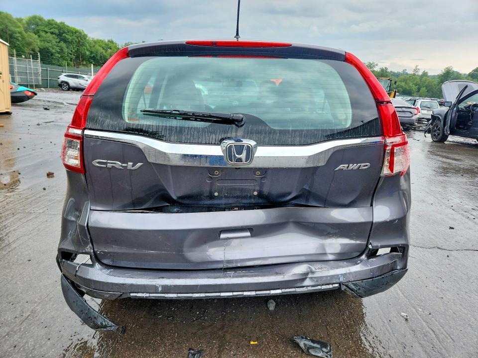 Photo 6 from auction – 2016 HONDA CR-V with VIN 2HKRM4H37GH610833