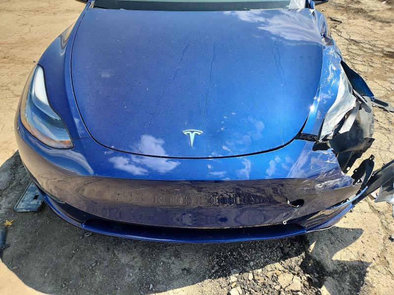 Снимка 11 от търг – 2023 TESLA MODEL Y с VIN 7SAYGAEE5PF794517
